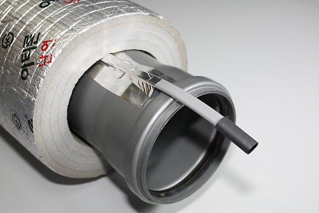 Саморегулирующийся греющий кабель для канализации